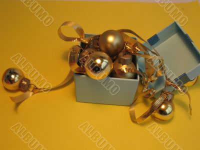 Blue gift box with golden balls