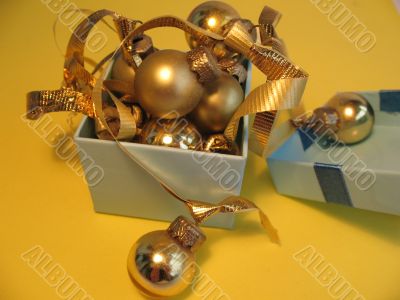 Blue gift box with golden balls