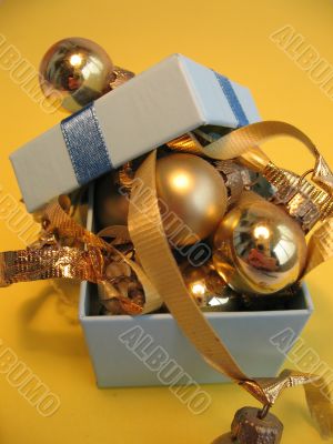 Blue gift box with golden balls