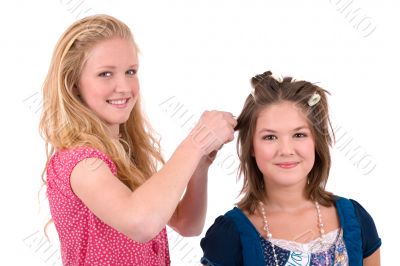 Doing her hair