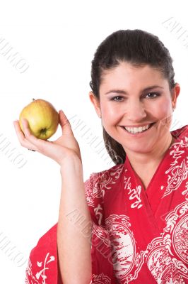 Holding up a apple