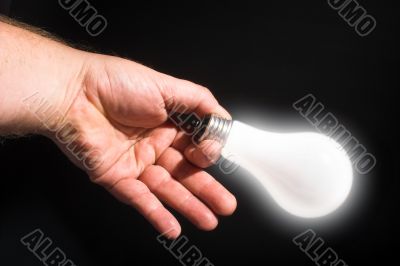 Holding a Light Bulb