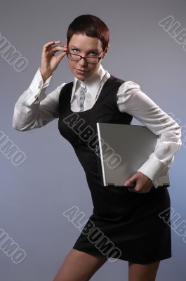 The business woman with a computer