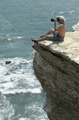 The photographer on a rock.