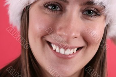 Cute woman in fuzzy Christmas hat