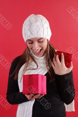Girl surprised opening gift