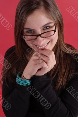 Young woman in glasses smiling