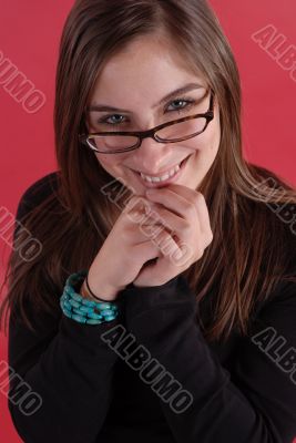 Young woman in glasses smiling