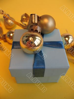 Christmas gift box and golden balls