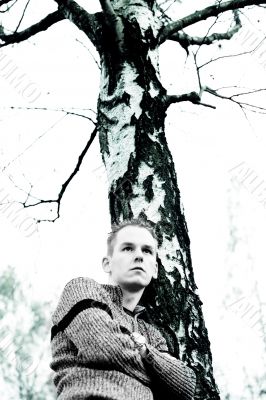 Boy and the dead tree