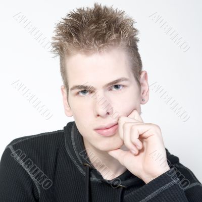 He is looking to the camera