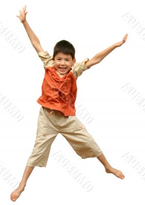 Boy jumps on white background.