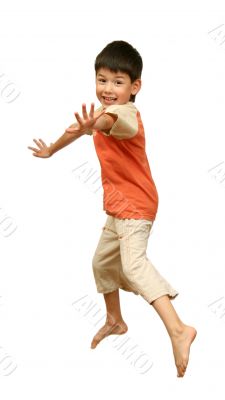 Boy jumps on white background.