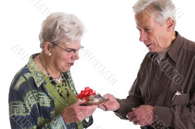 Giving her chocolates