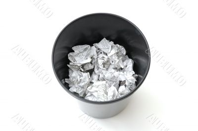 Bin half filled with paper