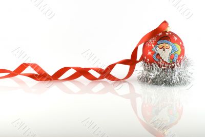 Red christmas ball with ribbon