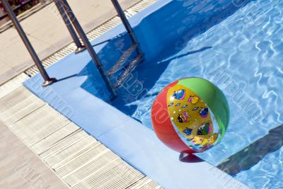 Inflatable ball in pool