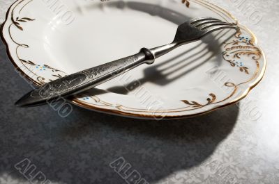 fork with a plate