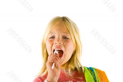 Little girl brushes her teeth