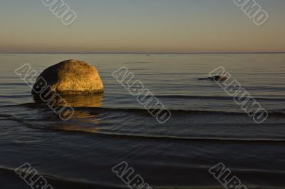 Sea shore in a sunset.