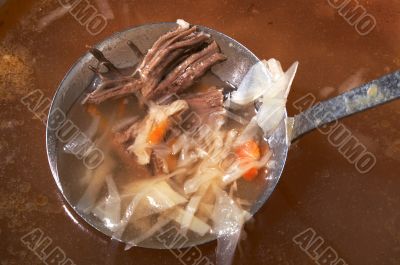 ladle with meat