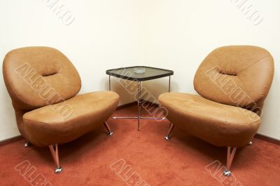 two leather armchairs