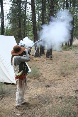 Mountain man firing his musket