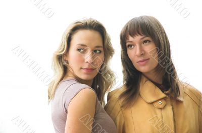 The blonde and the brunette on a white background