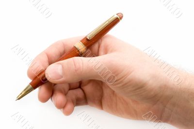 Hand with a pen