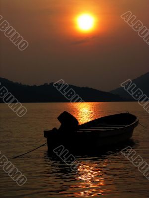 Boat At Sunset