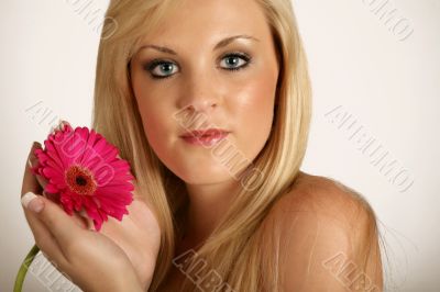 Beautifull woman with red flower