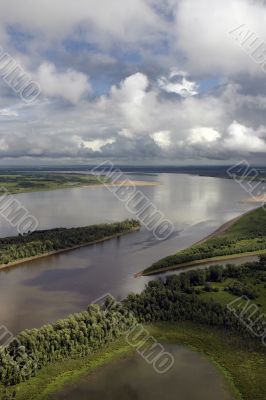 Clouds over big river.