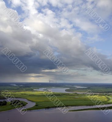 Clouds over big river.