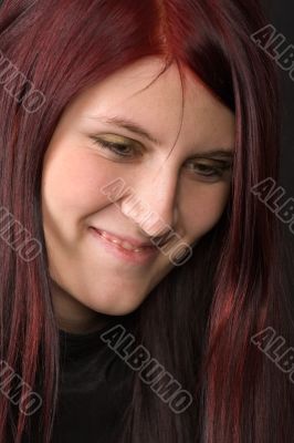 smiling red-haired woman