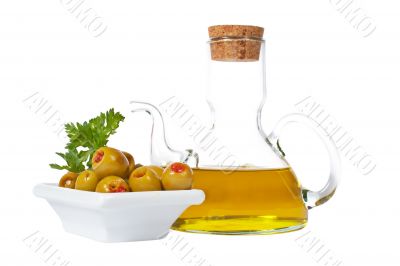 Oilcan and olives with parsley