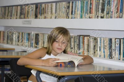 Girl in school library