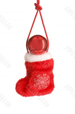 Red christmas sock on cord with red ball