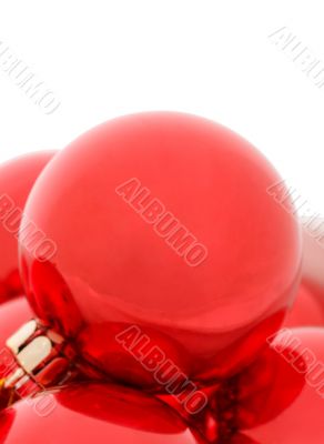 Red christmas balls isolated on white. Close-up
