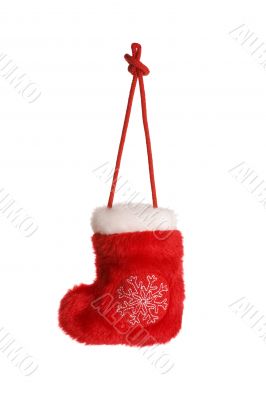 Red christmas sock with snowflake isolated on white
