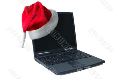 Cap of the santa on a notebook