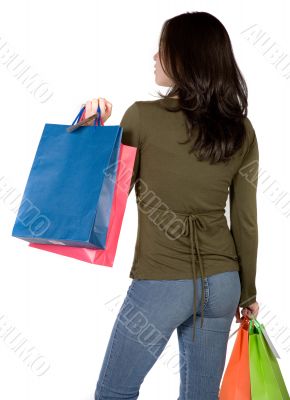 girl with shopping bags from behind