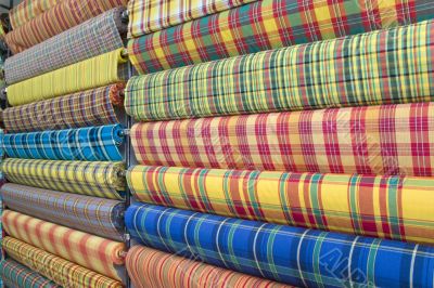 Colored rollers of fabric