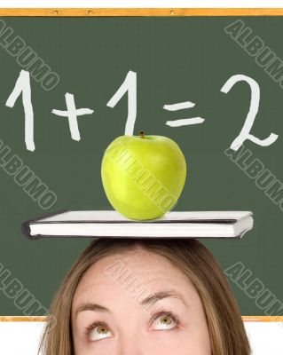 female student over a blackboard