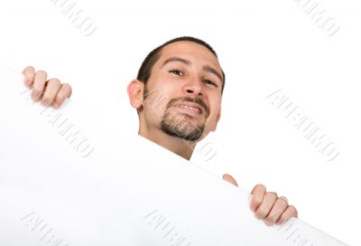 business man peeping over white banner