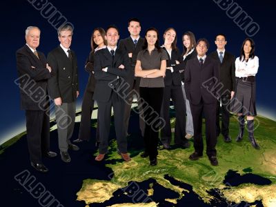 business team on top of the world