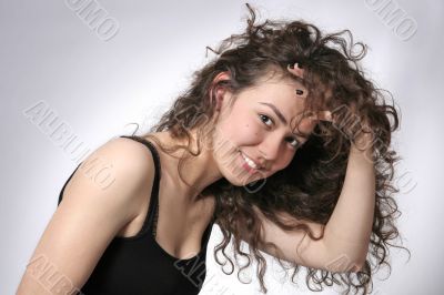 Portrait of beautiful smiling young brunette woman