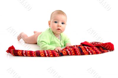 little baby in large red hut portrait