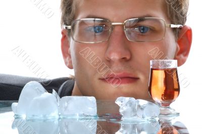 gold alcohol drink with ice