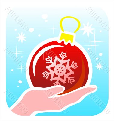 christmas ball in a hand