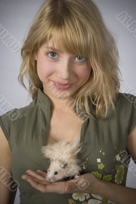 Portrait of beautiful girl with a mouse